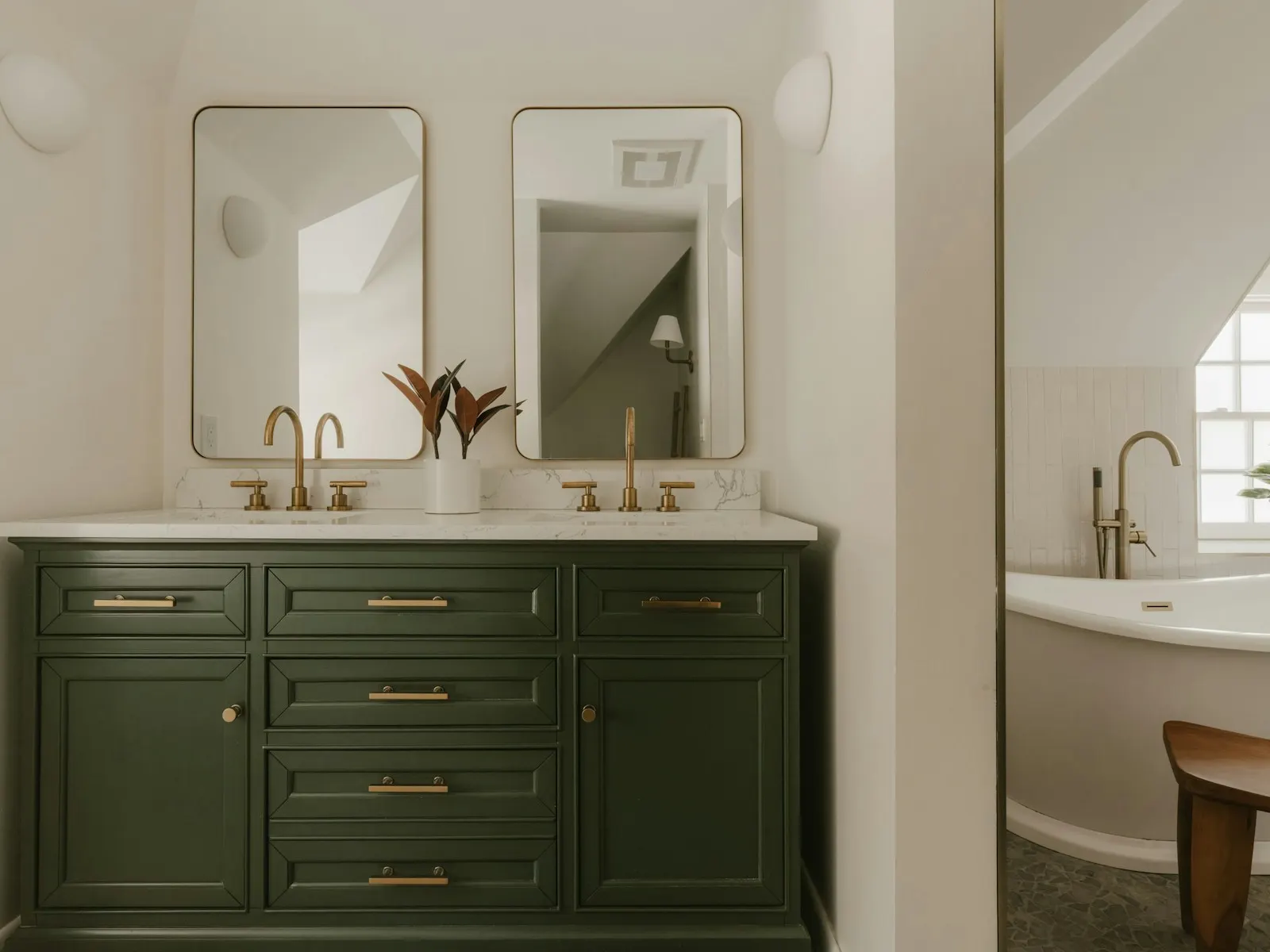 A freestanding vanity and bath shown as a representative fixture direction