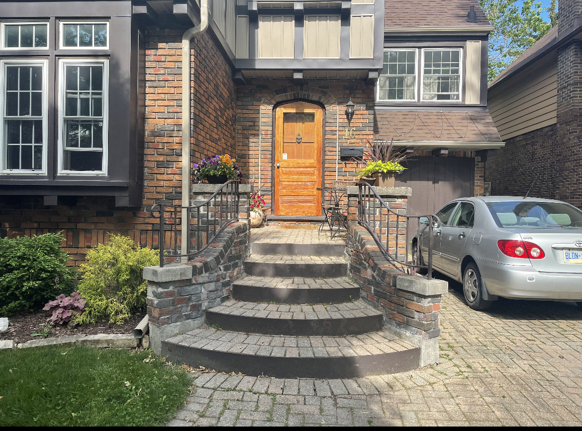 Damaged brick and failing mortar joints before facade repair in London Ontario