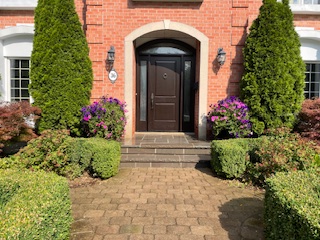 Close-up chimney masonry detail showing repointing and rebuild preparation
