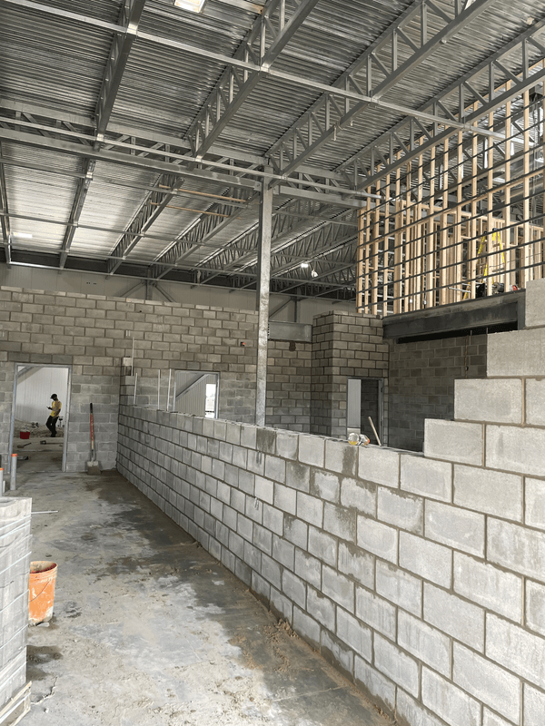 Custom stonework installation underway for a London commercial masonry project
